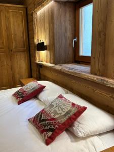Postel nebo postele na pokoji v ubytování L'Abreny