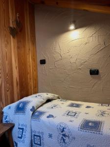 Postel nebo postele na pokoji v ubytování L'Abreny