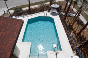 an overhead view of a swimming pool at a hotel at Fairfield Inn & Suites by Marriott Clearwater Beach in Clearwater Beach