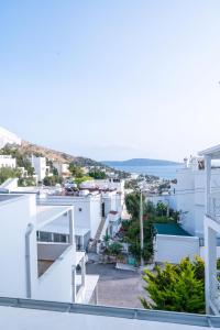 a view of the city from the balcony of a house at İlya Apart 2 in Bodrum City