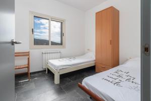 Posteľ alebo postele v izbe v ubytovaní Villa Cuarenta y Dos