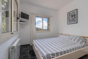 Posteľ alebo postele v izbe v ubytovaní Villa Cuarenta y Dos + 21 fotografií