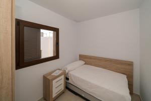 Postel nebo postele na pokoji v ubytování Casa Domi