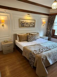 Postel nebo postele na pokoji v ubytování Mehmet Efendi Mansion & Hotel