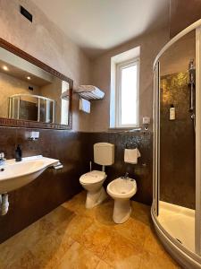 Łazienka w obiekcie Hotel Regina