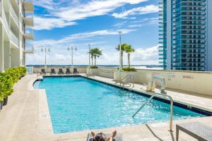 a swimming pool on the roof of a building at Brickell Miami Unit, Amazing view, balcony, Pool, 1 free Parking in Miami