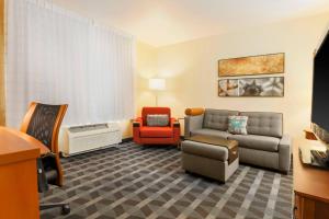a living room with a couch and a chair at TownePlace Suites by Marriott Yuma in Yuma