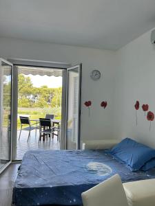 Легло или легла в стая в Suite Pineto Mare Mykonos Residence