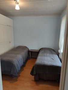 Postel nebo postele na pokoji v ubytování Nicolas apartment