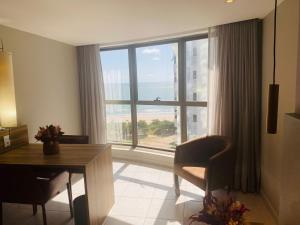 Ruang duduk di Flat Beach Class Executive - Beira Mar de Boa Viagem