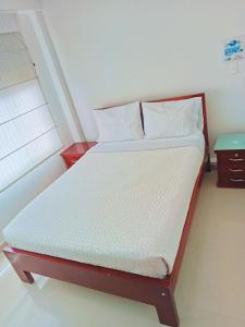 Postel nebo postele na pokoji v ubytování Stay In Bogota