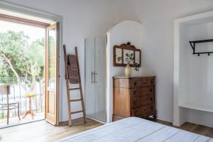 Postel nebo postele na pokoji v ubytování Iancura - B&B di design a Salina