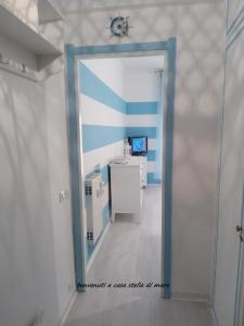 a bathroom with a mirror in a room at stella di mare in Rapallo +27 photos