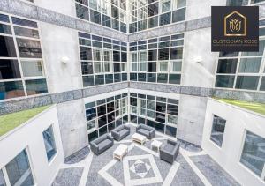 a view from the top of a building with chairs at Two bedroom - Central Peterborough - New Year Discount in Peterborough