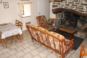 Posezení v ubytování Genevrier Cottage