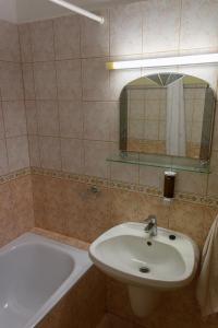 Kúpeľňa v ubytovaní Erika Apartman