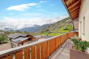 a balcony with a view of the mountains at Ferienwohnungen Zwick Maroles in Malles Venosta