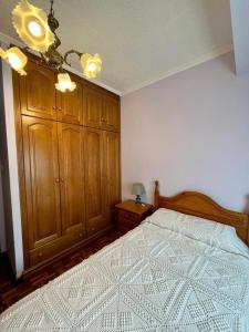 Posteľ alebo postele v izbe v ubytovaní Piso en pleno centro de Miño derecha