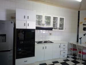 Virtuvė arba virtuvėlė apgyvendinimo įstaigoje Guest Houses Great choice