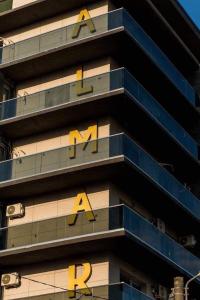 a tall building with the word ak on it at DXN Luxury Apartment 5 in Năvodari