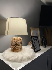 A television and/or entertainment centre at Beta House Apartments