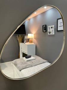 A bed or beds in a room at Beta House Apartments
