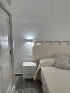 Postel nebo postele na pokoji v ubytování Sa Jacca Albergo Rurale