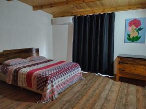 En eller flere senge i et værelse på Hospedaje Recuerdos