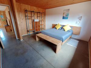 Postel nebo postele na pokoji v ubytování 7 Olas lodge