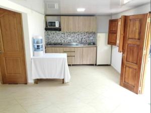 Kuhinja ili čajna kuhinja u objektu Jardín de la Inmaculada - Cabaña +4 fotografije