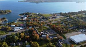 an aerial view of a small town by the water at Auberge Gisele's Inn in Baddeck