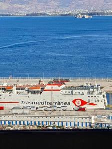 a group of ships docked in the water at Al-marsa2 in Al Hoceïma