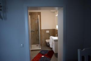 Ένα μπάνιο στο Ferienwohnung Finn