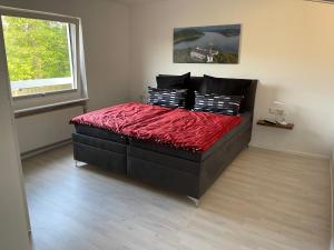 Postel nebo postele na pokoji v ubytování Ferienwohnung Zum Wildpark