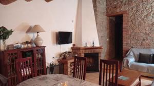 TV a/nebo společenská místnost v ubytování Apartamento en pleno Montseny Mas Romeu Turisme Rural