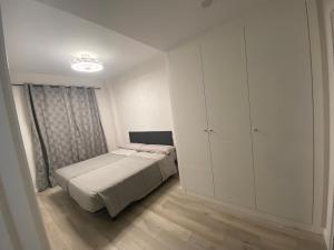 Postel nebo postele na pokoji v ubytování Apartamento Valle-Niza, Almayate, Vélez málaga, torre del mar ,2 dormitorios + 24 fotografií