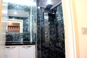 Ванная комната в Venus Suite Hotel