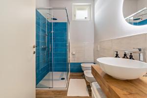 A bathroom at Cavalino Boutique 1 Még 4 kép
