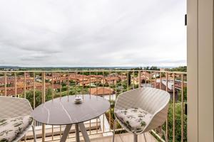 A balcony or terrace at Cavalino Boutique 1