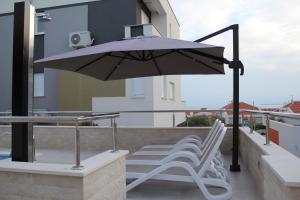 Balkón nebo terasa v ubytování Apartment Villa Lumada with Pool