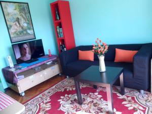 Μια τηλεόραση ή/και κέντρο ψυχαγωγίας στο Cheap Booking Rooms
