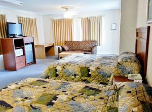 Voodi või voodid majutusasutuse Alpine Motel toas