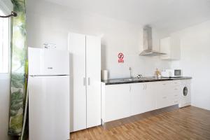 Kuchyň nebo kuchyňský kout v ubytování Casa Manoli 3 Chiclana