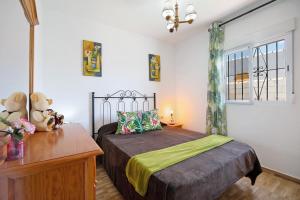Postel nebo postele na pokoji v ubytování Casa Manoli 3 Chiclana