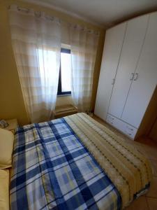 Postel nebo postele na pokoji v ubytování Flat Le Rose + 5 fotografií