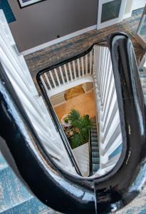 an overhead view of a spiral staircase in a house at Clifton Arms Hotel in Lytham St Annes
