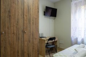 Televízia a/alebo spoločenská miestnosť v ubytovaní San Juan Apartment Málaga Center