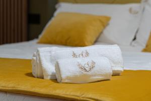 Postel nebo postele na pokoji v ubytování Sofi' Center Rooms