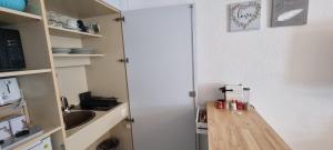 Kuchyň nebo kuchyňský kout v ubytování Holiday Suite 304 Residenza Lago di Lugano