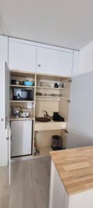 Kuchyň nebo kuchyňský kout v ubytování Holiday Suite 304 Residenza Lago di Lugano